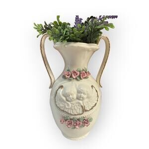 Vintage two handle jar with handcrafted floral arrangement